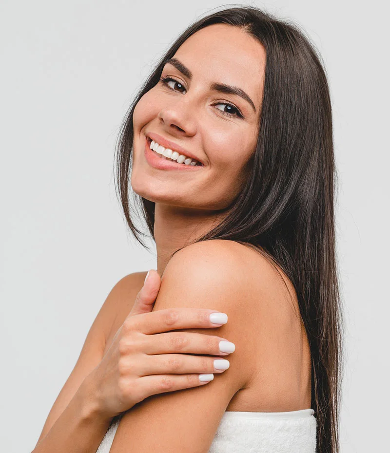 Brunette woman with arms crossed