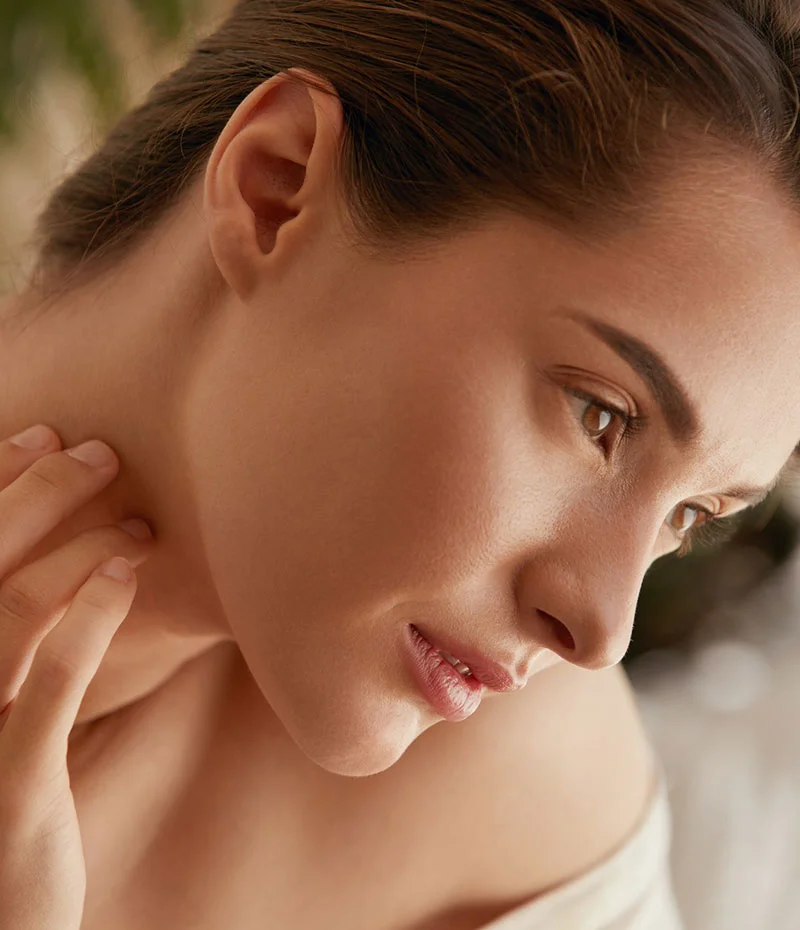 Woman looking to her left laying down