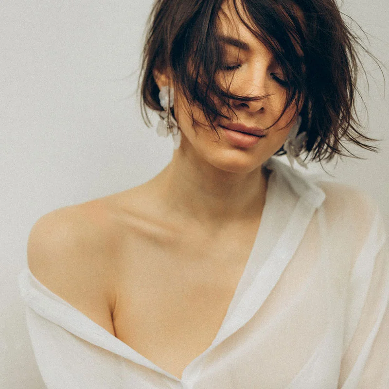 Woman with eyes closed