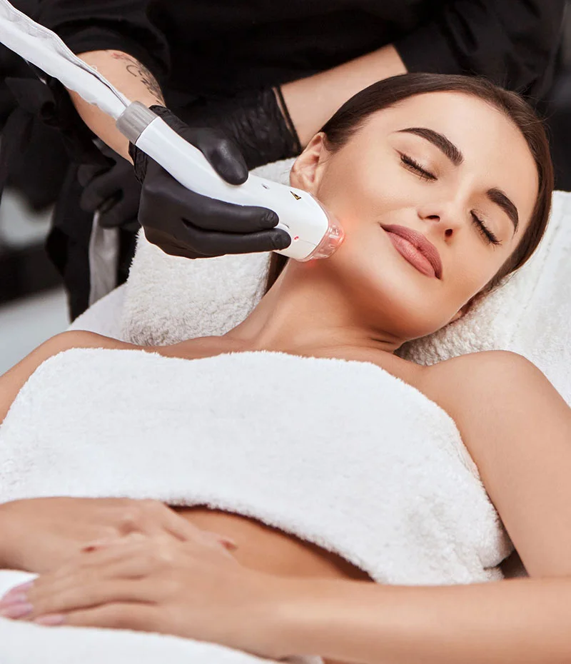 Woman receiving fraxel laser skin resurfacing