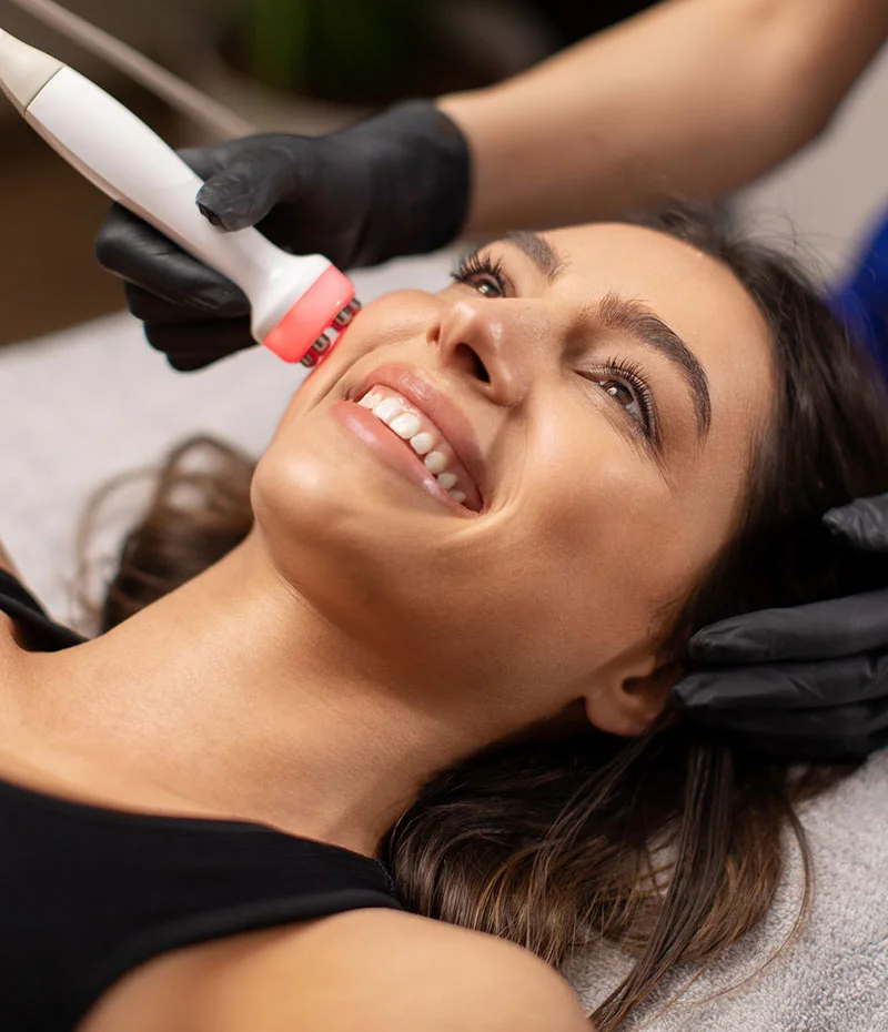 Woman getting laser treatment on her face