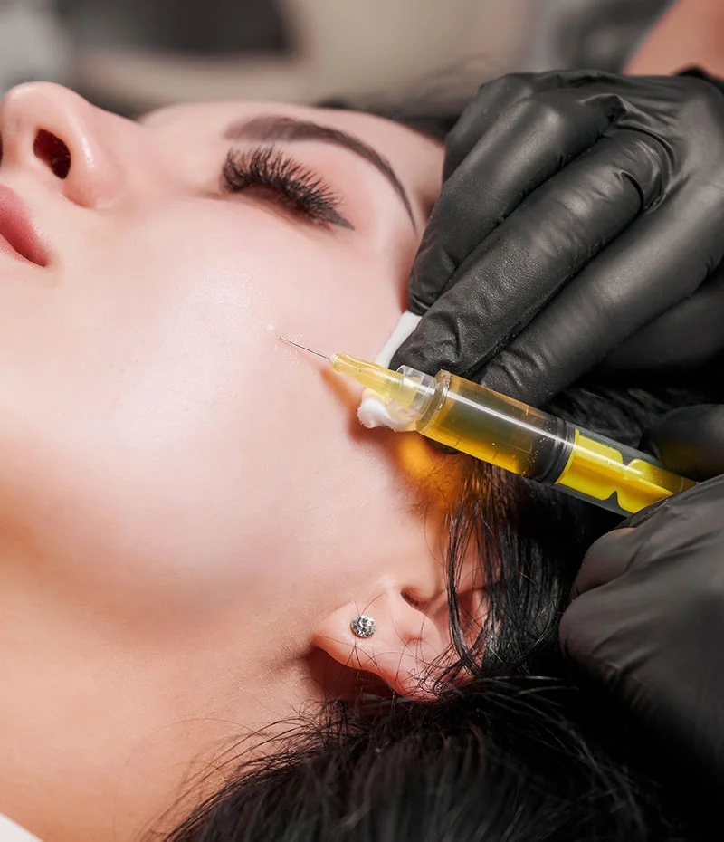 Woman receiving PRP injections